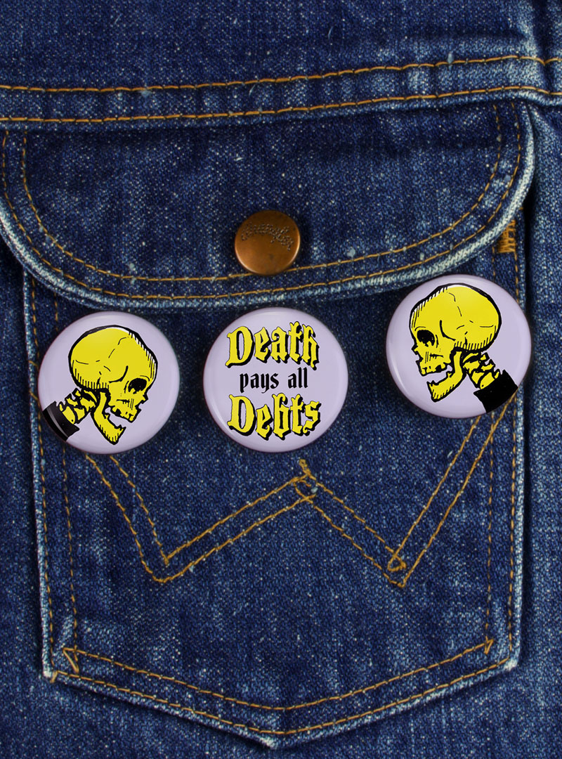 Skull pin set with slogan Death Pays All Debts by Miss Mary for RetroButtons.com